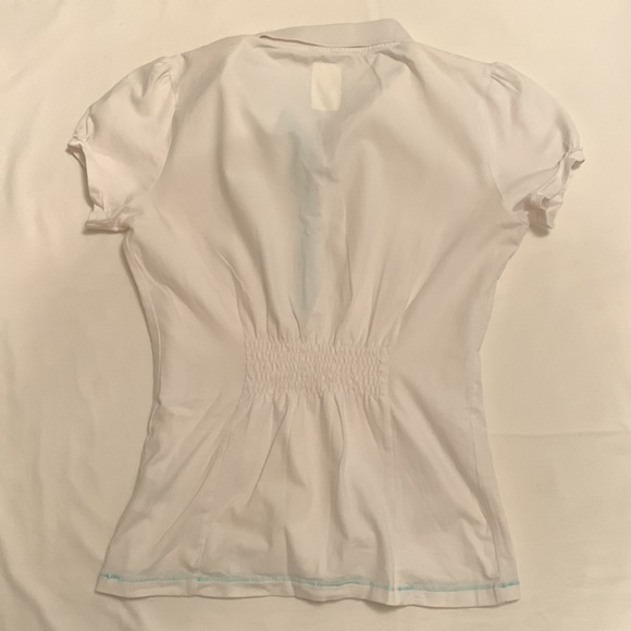 LPGA - ladies white golf tee with cap sleeves, 6 snap button collar - Picture 2 of 5